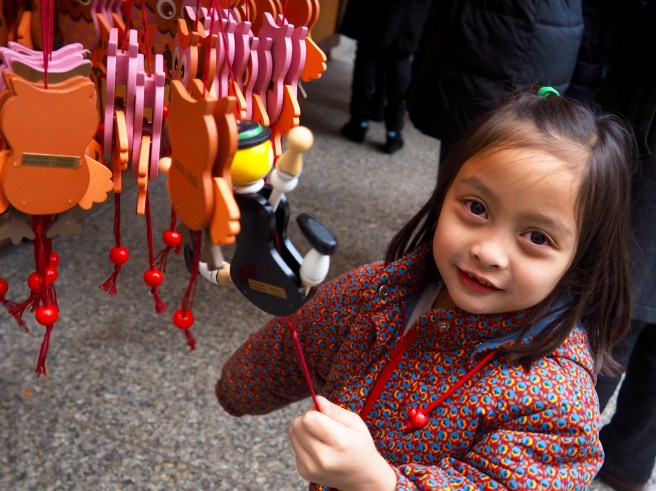 This little girl and I were both having fun making some of the ornaments dance. How cute is she?!